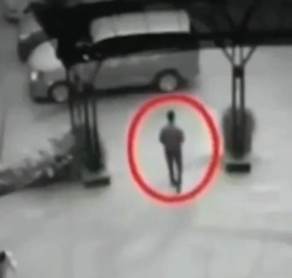 Unexplained Shadow Moving from on Person to Another