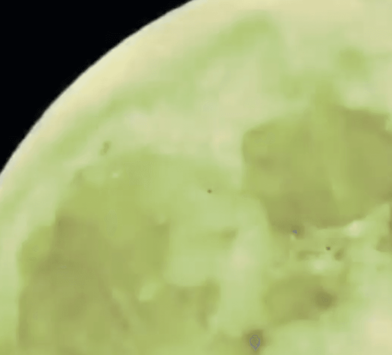 Aliens flying near the moon